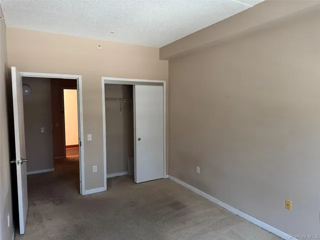 an empty room with closet