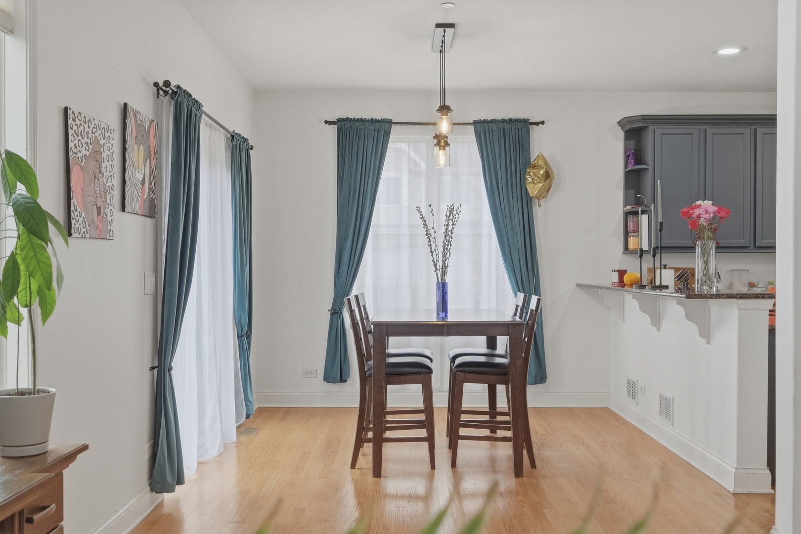301 Nicole Way Itasca, IL 60143 - Photo 17 of 38 a view of a dining room with furniture and wooden floor