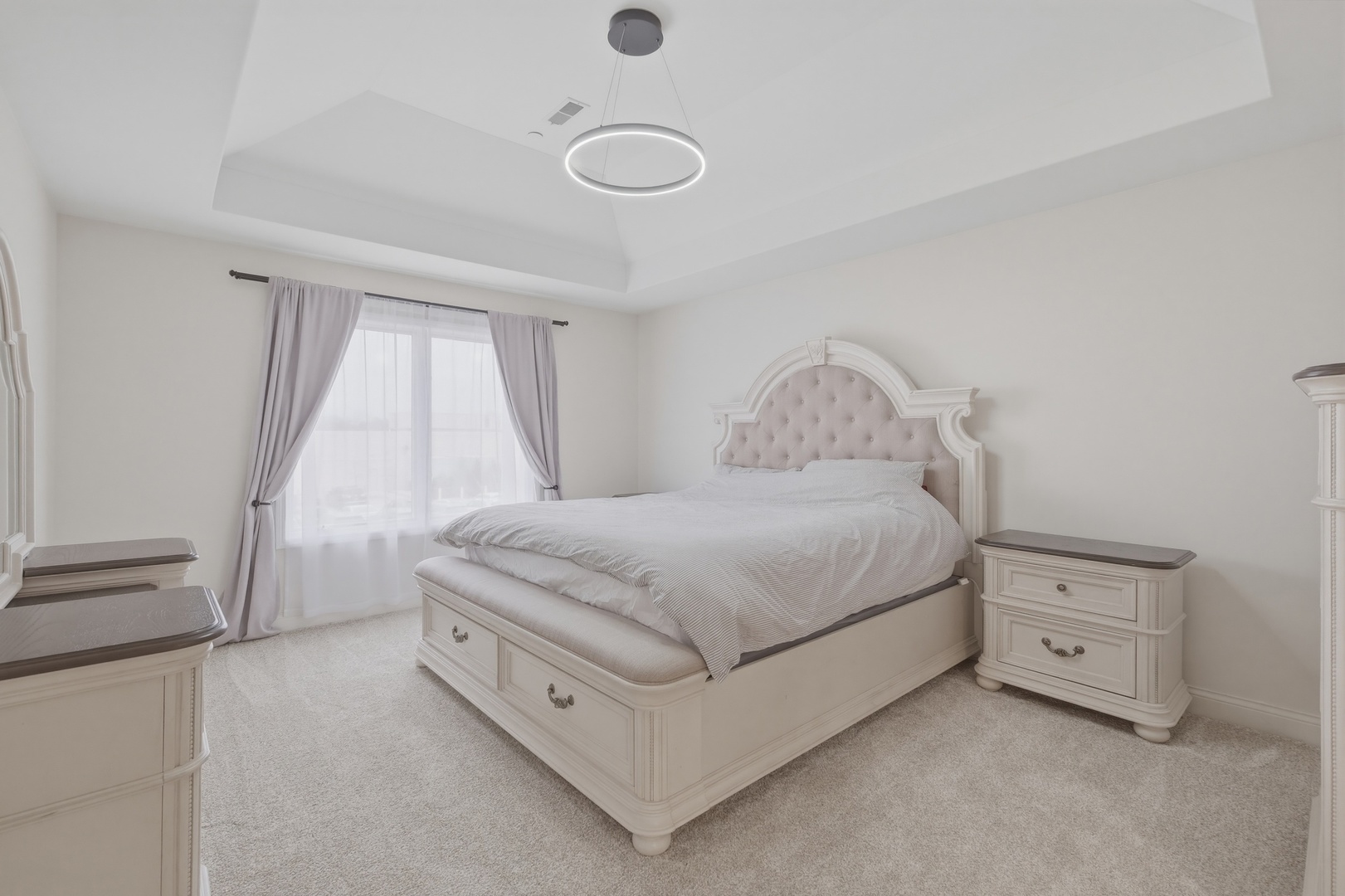 301 Nicole Way Itasca, IL 60143 - Photo 19 of 38 a spacious bedroom with a bed and a window