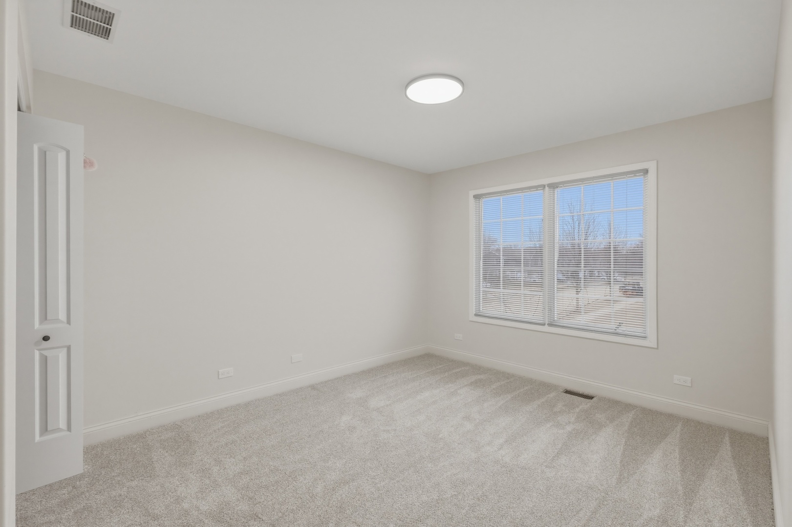 301 Nicole Way Itasca, IL 60143 - Photo 26 of 38 a view of an empty room with a window
