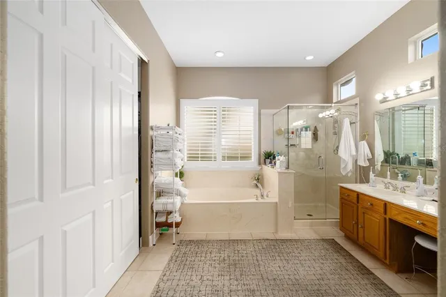 a bathroom with a sink double vanity and a mirror