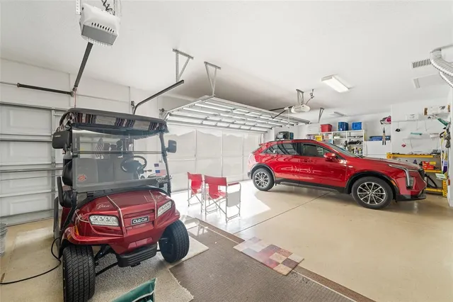an aerial view of residential houses with yard