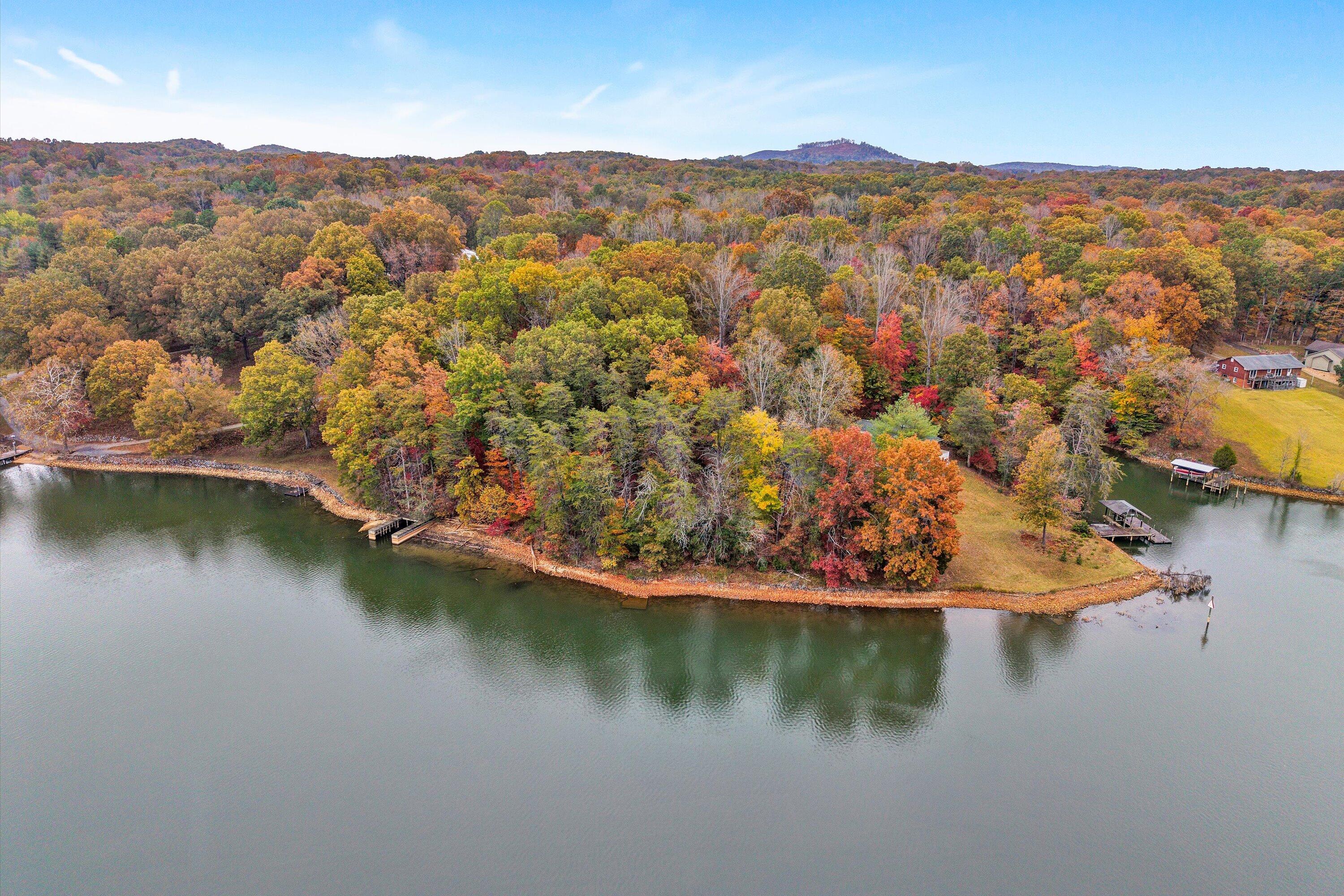 0 Thomason Lane Goodview, VA 24095 - Photo 1 of 15 an aerial view of residential houses with outdoor space and lake view