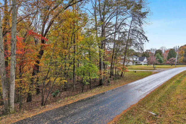 a view of a swimming pool with an outdoor space and seating area