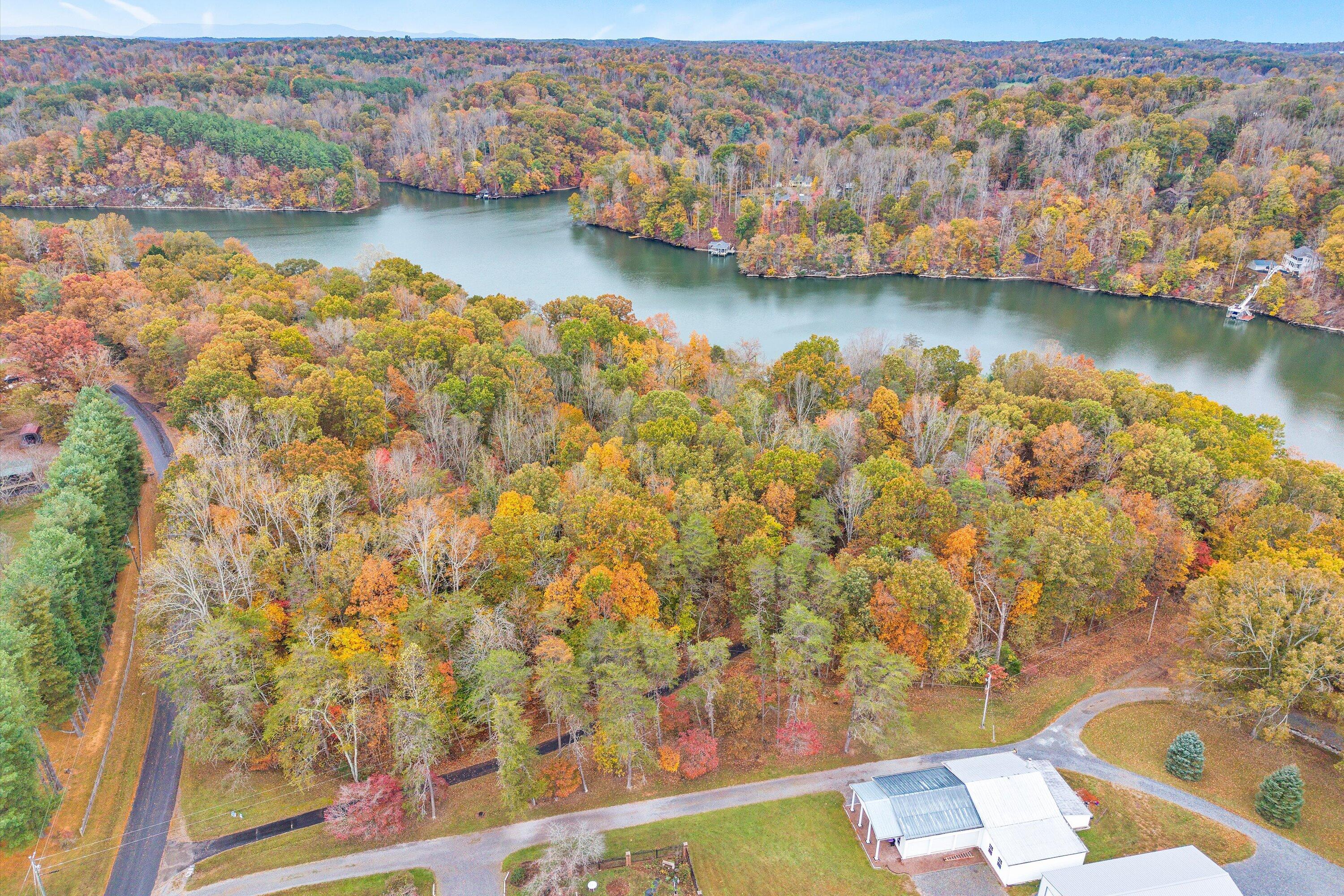0 Thomason Lane Goodview, VA 24095 - Photo 8 of 15 an aerial view of residential houses with outdoor space and lake view