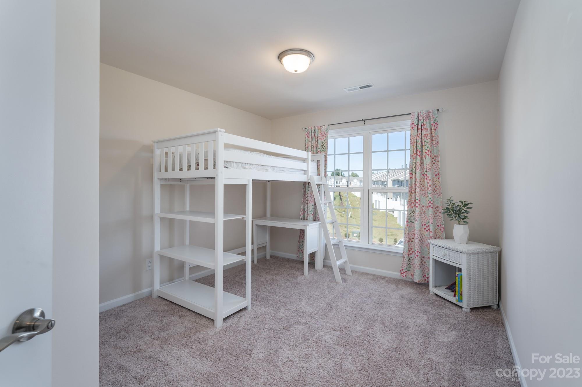 467 Hunters Dance Road Fort Mill, SC 29708 - Photo 17 of 28 a view of an empty room with a window