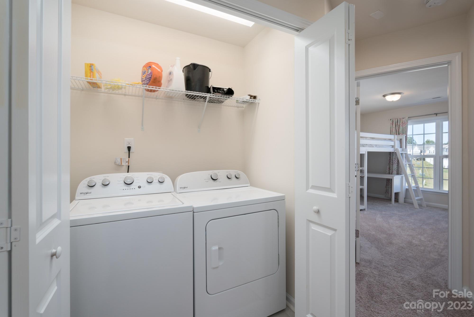 467 Hunters Dance Road Fort Mill, SC 29708 - Photo 18 of 28 a view of storage and utility room with washer and dryer