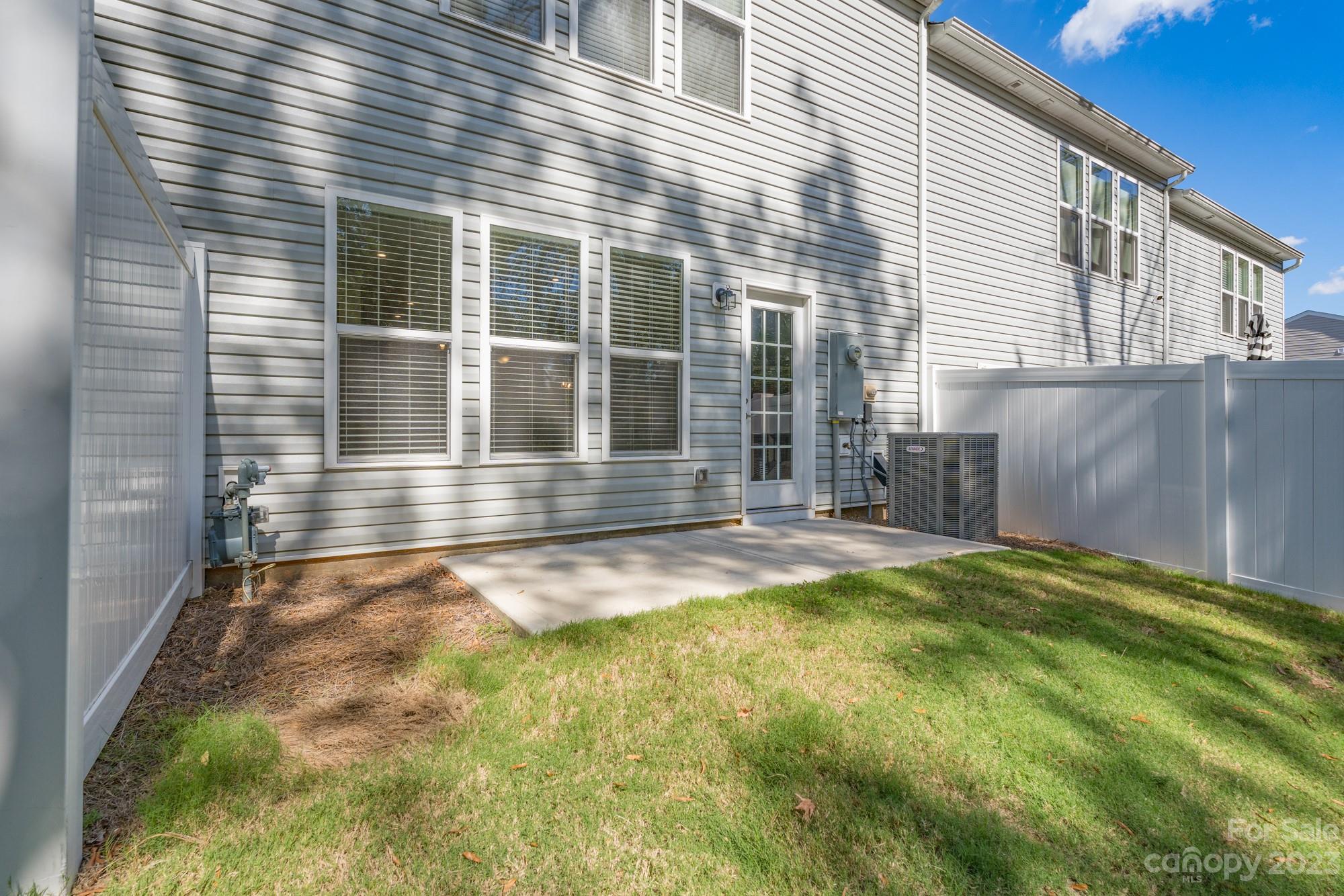 467 Hunters Dance Road Fort Mill, SC 29708 - Photo 20 of 28 a front view of a house with a yard