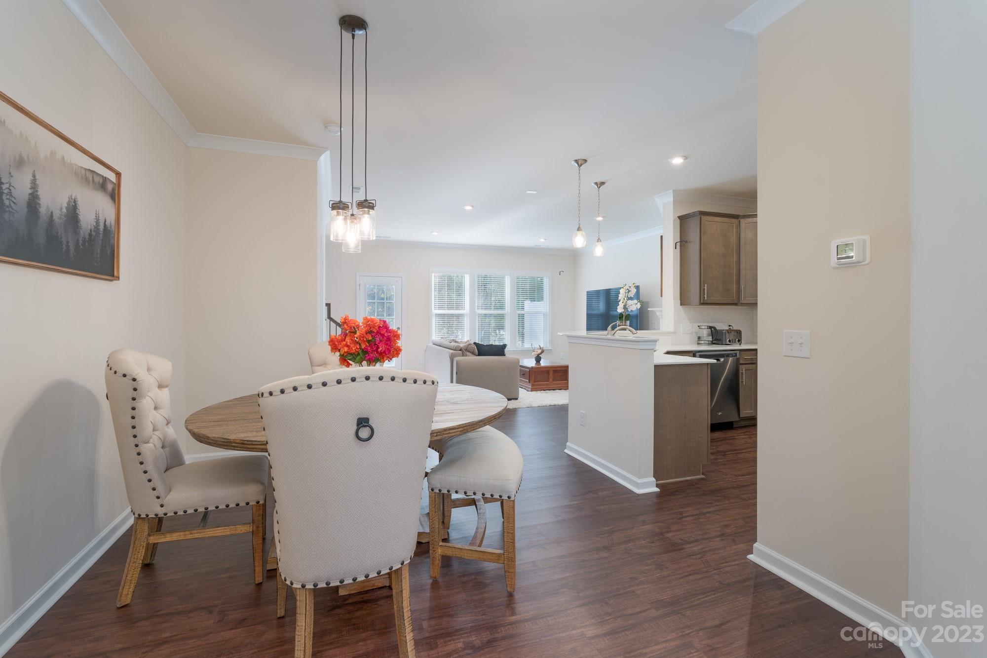 467 Hunters Dance Road Fort Mill, SC 29708 - Photo 3 of 28 a large white kitchen with white cabinets