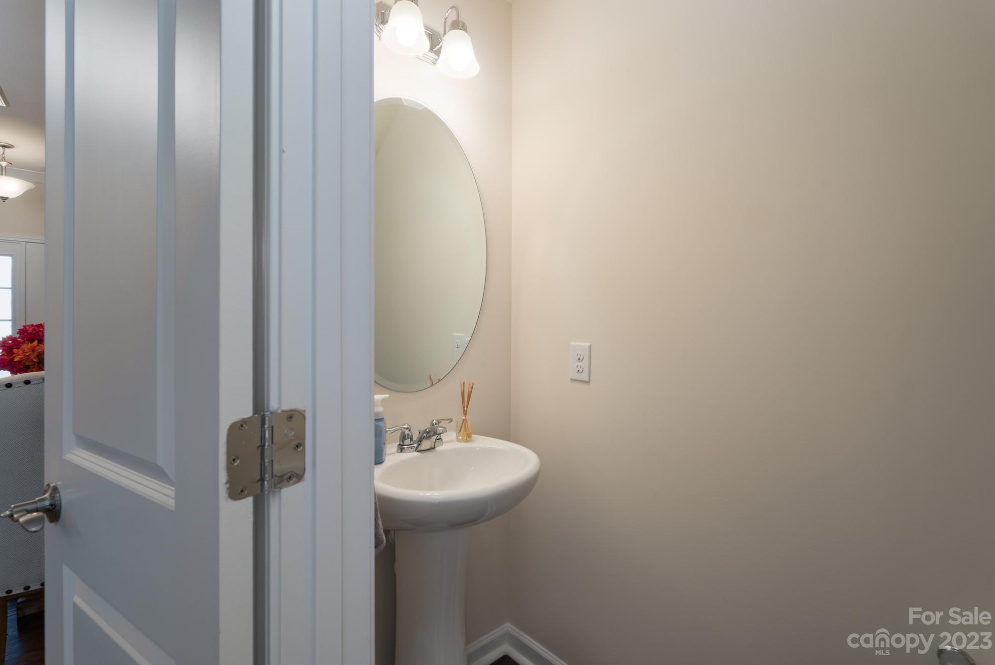 467 Hunters Dance Road Fort Mill, SC 29708 - Photo 10 of 28 a bathroom with a sink and mirror