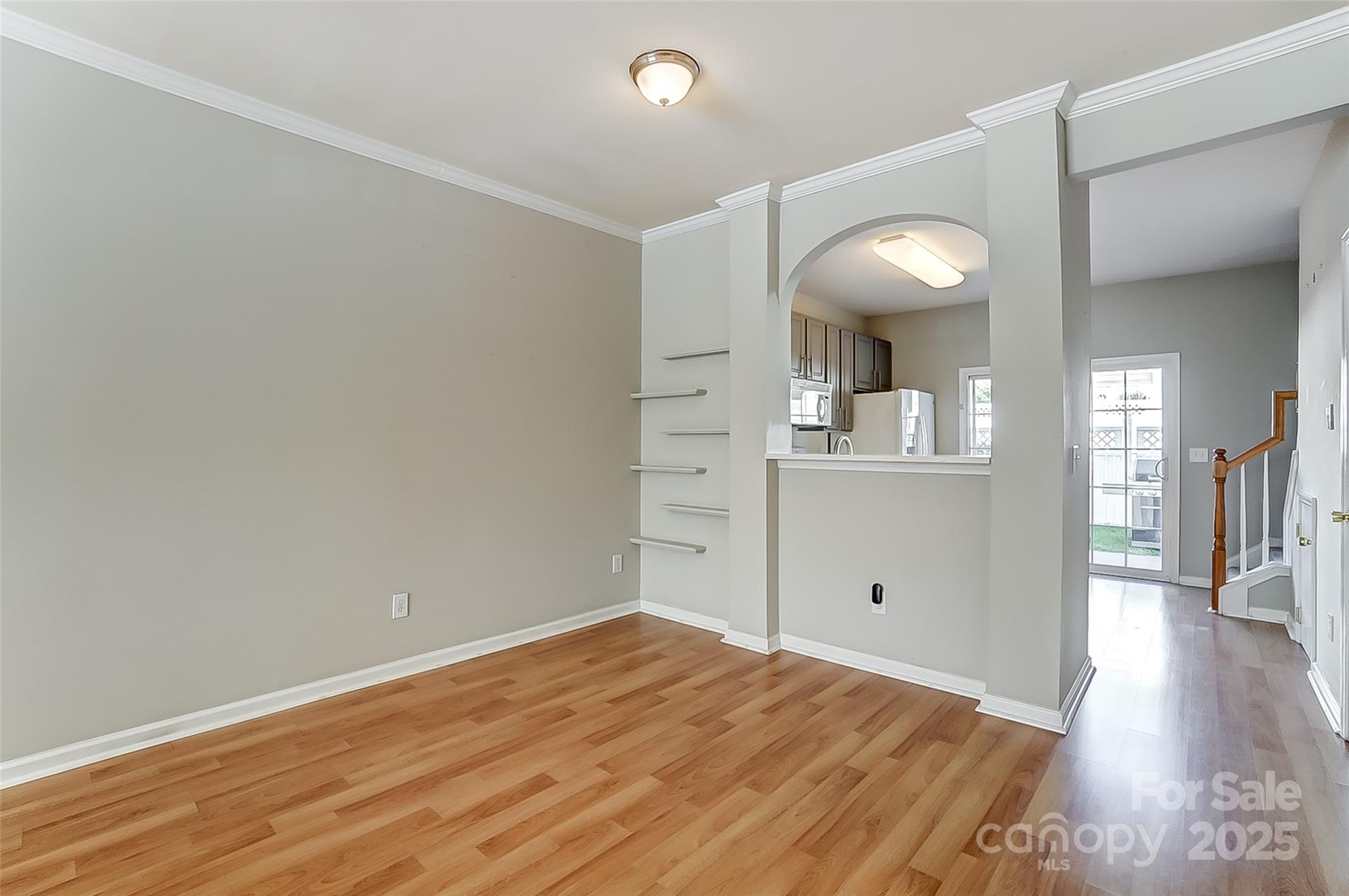 928 Azurine Circle Fort Mill, SC 29708 - Photo 18 of 33 wooden floor in an empty room with a window