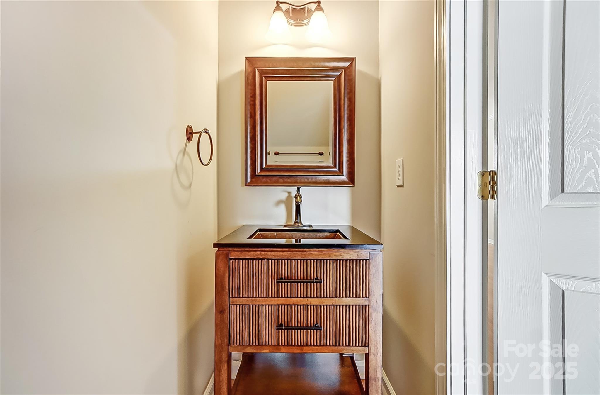 928 Azurine Circle Fort Mill, SC 29708 - Photo 19 of 33 a view of a hallway with wooden floor and cabinet