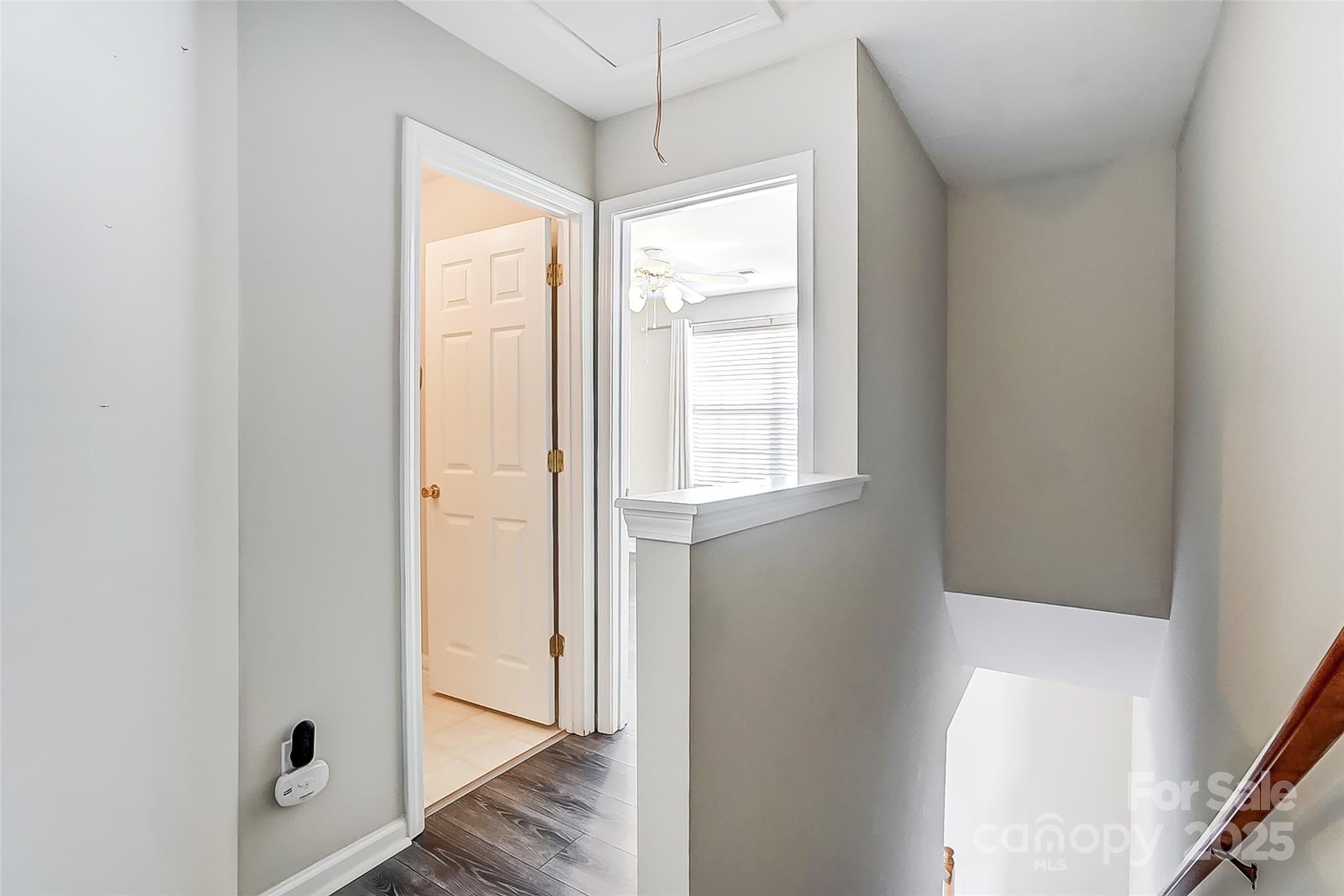 928 Azurine Circle Fort Mill, SC 29708 - Photo 20 of 33 a view of an empty room with wooden floor and a window