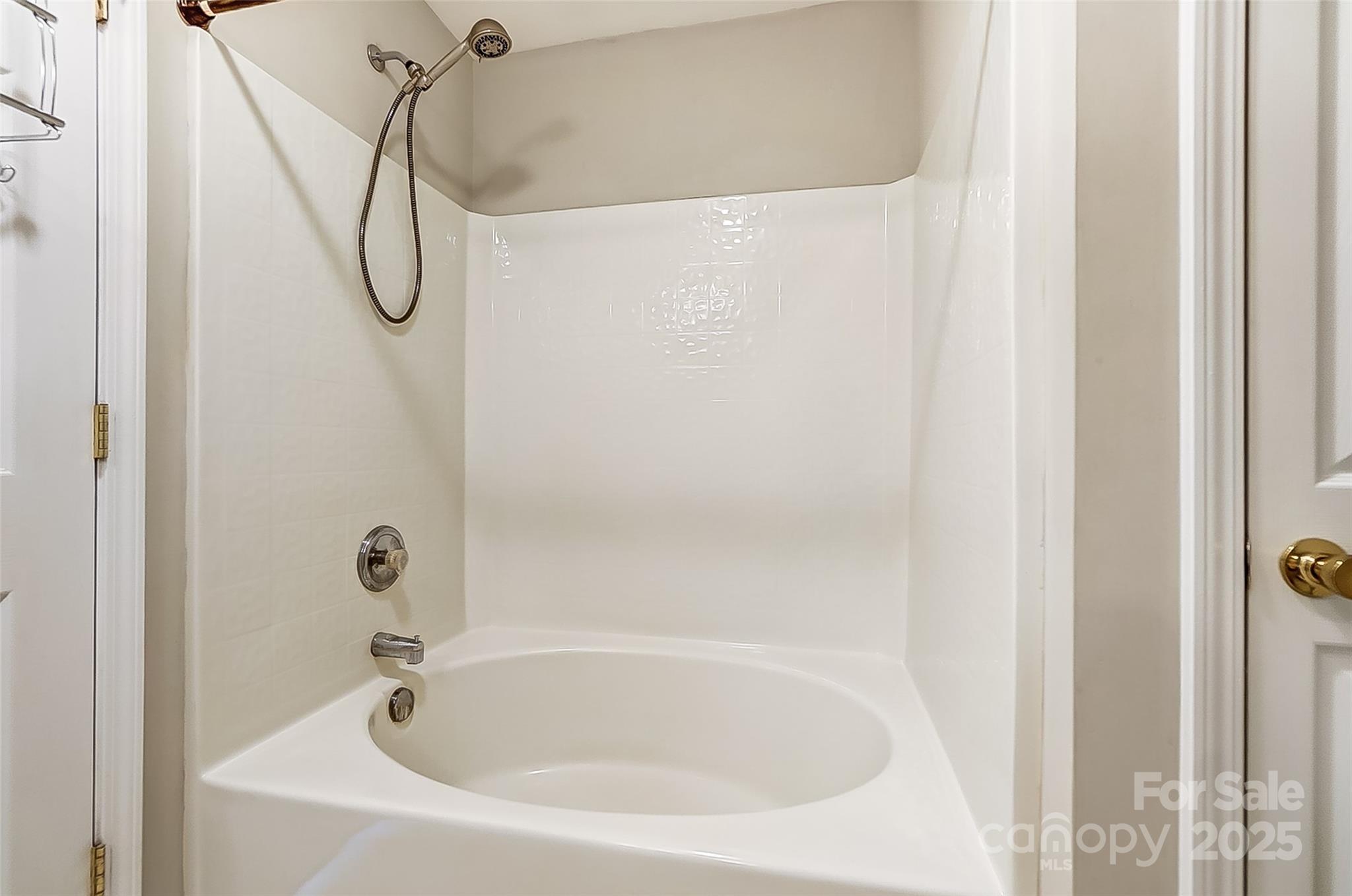 928 Azurine Circle Fort Mill, SC 29708 - Photo 27 of 33 a white bath tub sitting next to a shower