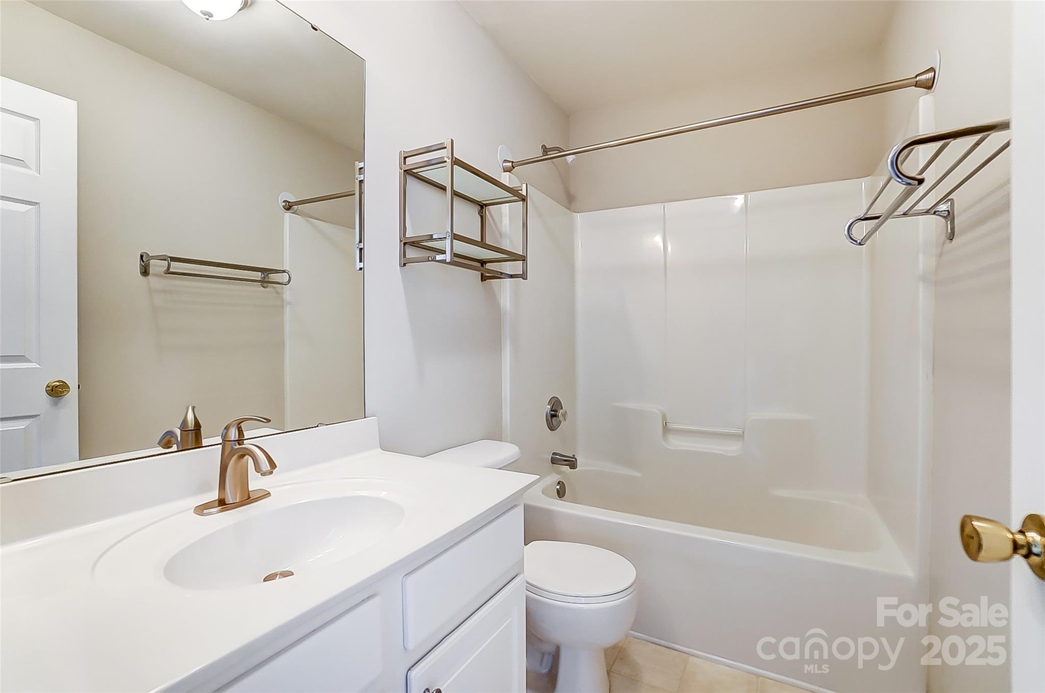 928 Azurine Circle Fort Mill, SC 29708 - Photo 32 of 33 a bathroom with a sink toilet and shower