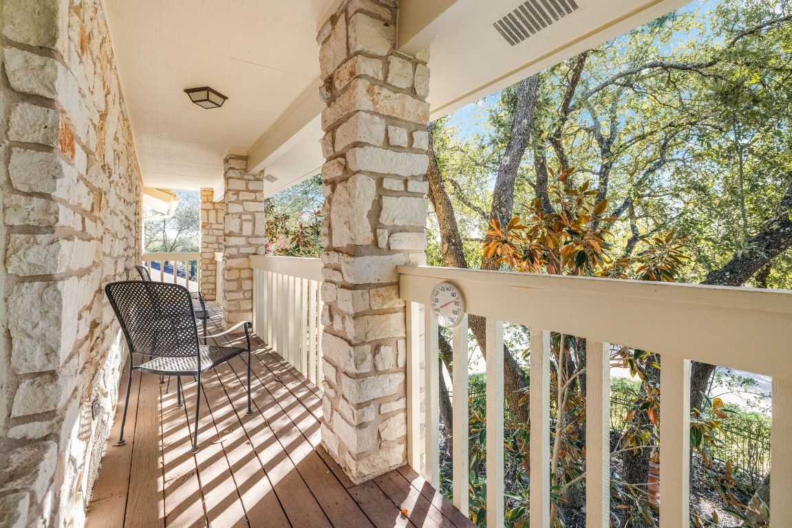 1508 Ben Crenshaw Way Austin, TX 78746 - Photo 20 of 40 a view of a balcony with chairs