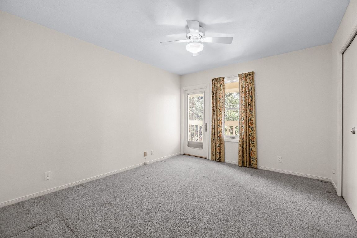 1508 Ben Crenshaw Way Austin, TX 78746 - Photo 23 of 40 wooden floor in an empty room