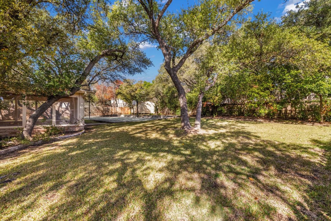 1508 Ben Crenshaw Way Austin, TX 78746 - Photo 28 of 40 a view of street with large trees