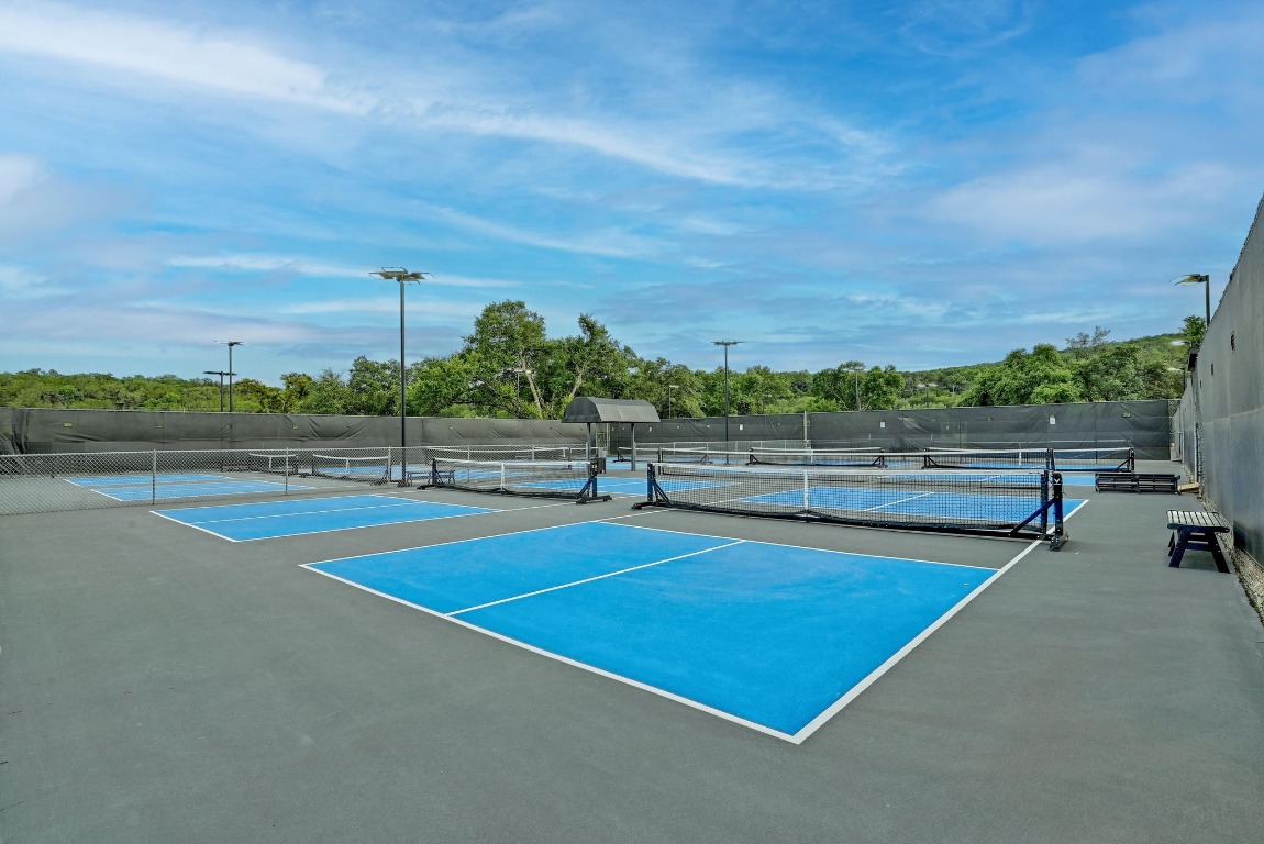 1508 Ben Crenshaw Way Austin, TX 78746 - Photo 31 of 40 a view of a tennis court