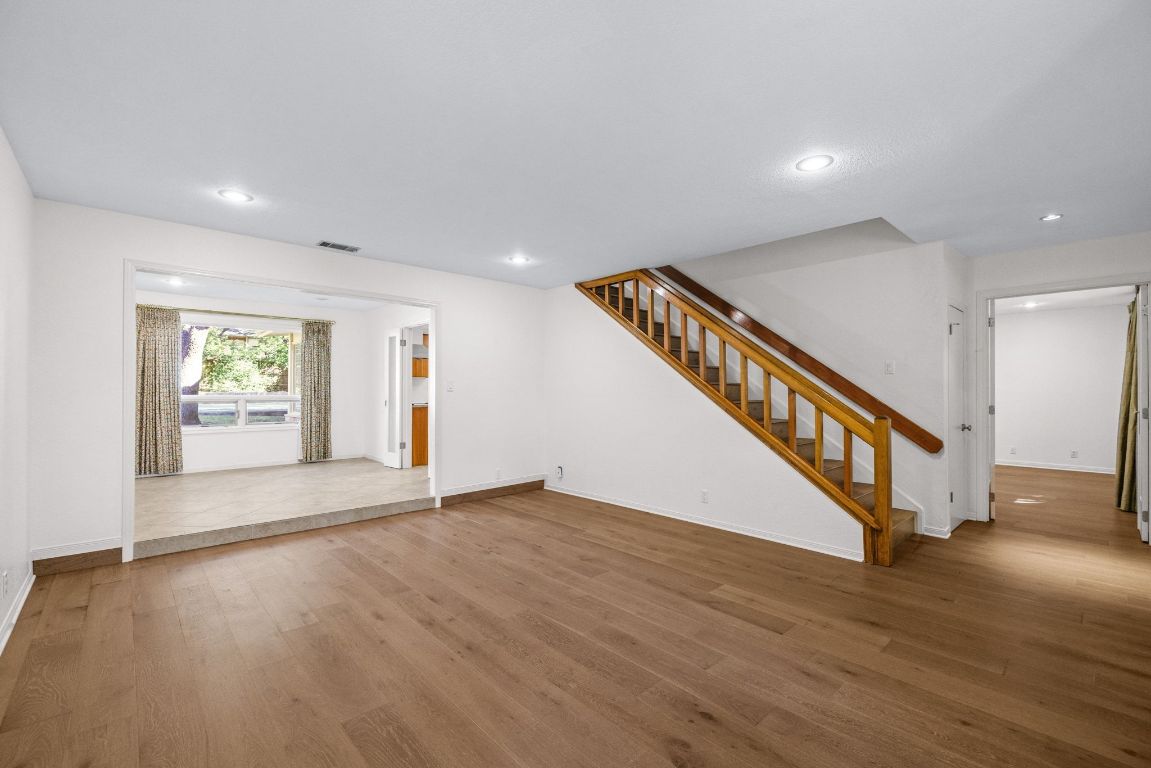 1508 Ben Crenshaw Way Austin, TX 78746 - Photo 4 of 40 a view of an entryway with wooden floor