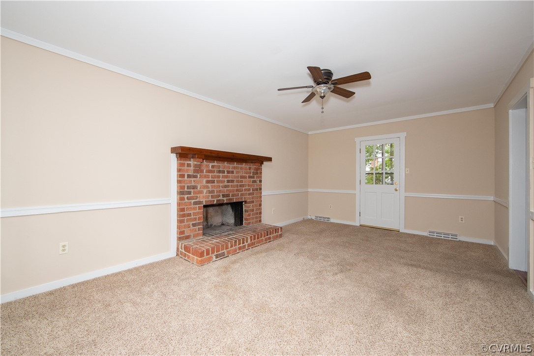 4702 Wilconna Road Chesterfield, VA 23832 - Photo 16 of 27 an empty room with windows and fireplace