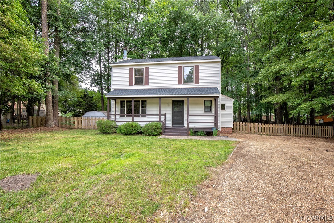 4702 Wilconna Road Chesterfield, VA 23832 - Photo 2 of 27 a front view of a house with a garden