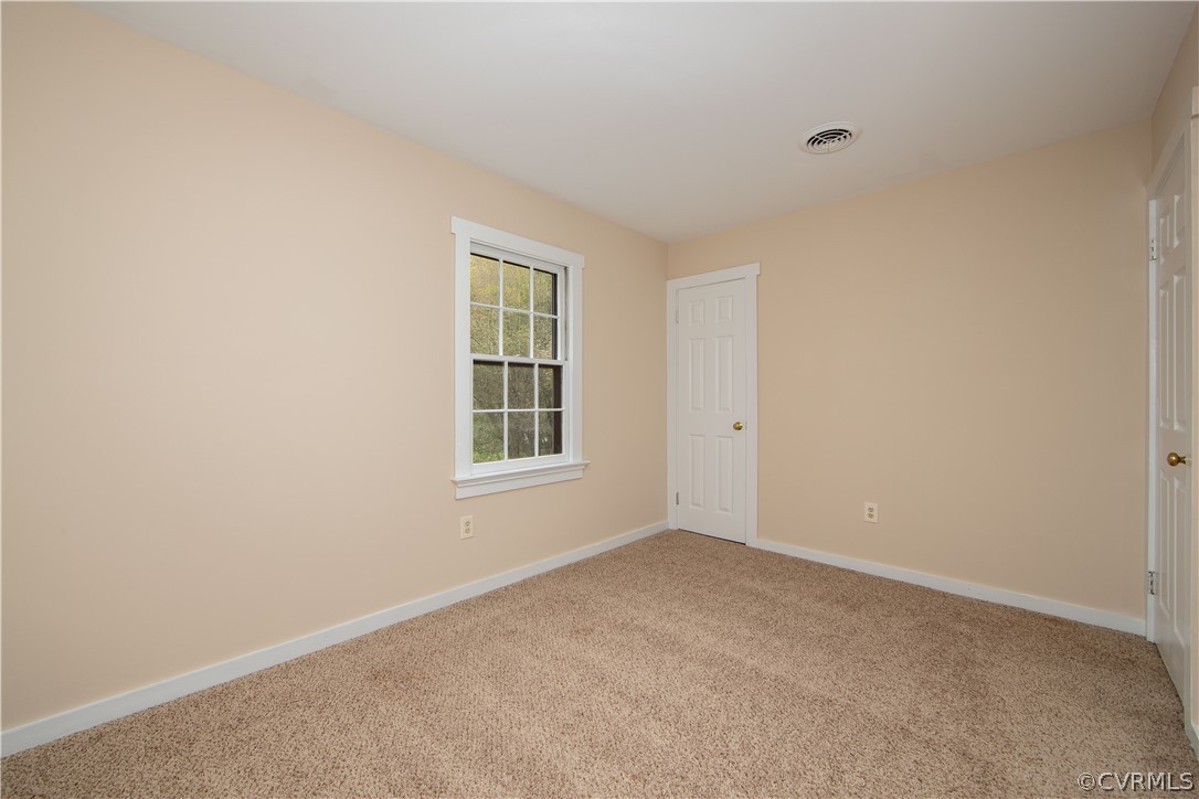 4702 Wilconna Road Chesterfield, VA 23832 - Photo 23 of 27 an empty room with windows
