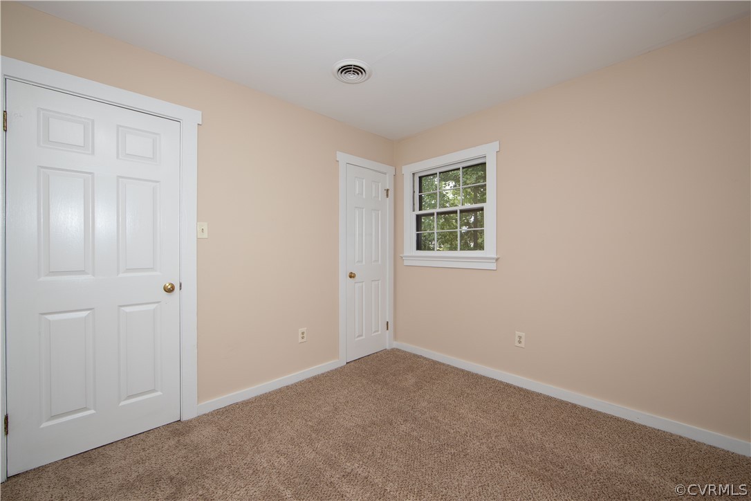 4702 Wilconna Road Chesterfield, VA 23832 - Photo 24 of 27 an empty room with windows