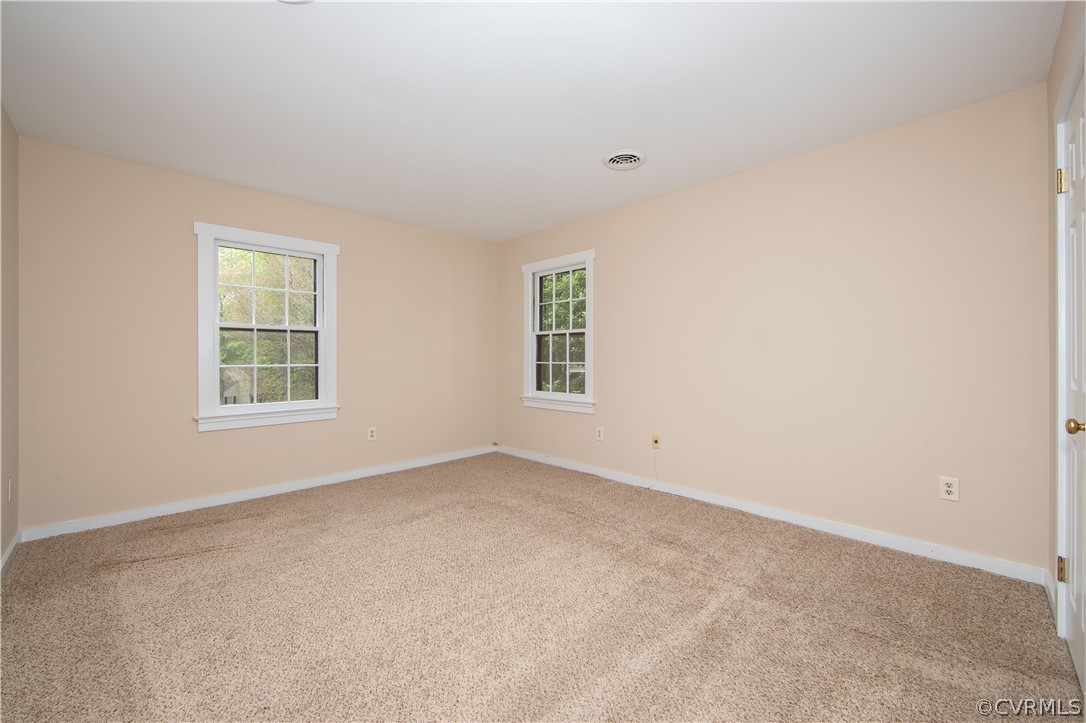4702 Wilconna Road Chesterfield, VA 23832 - Photo 26 of 27 an empty room with windows