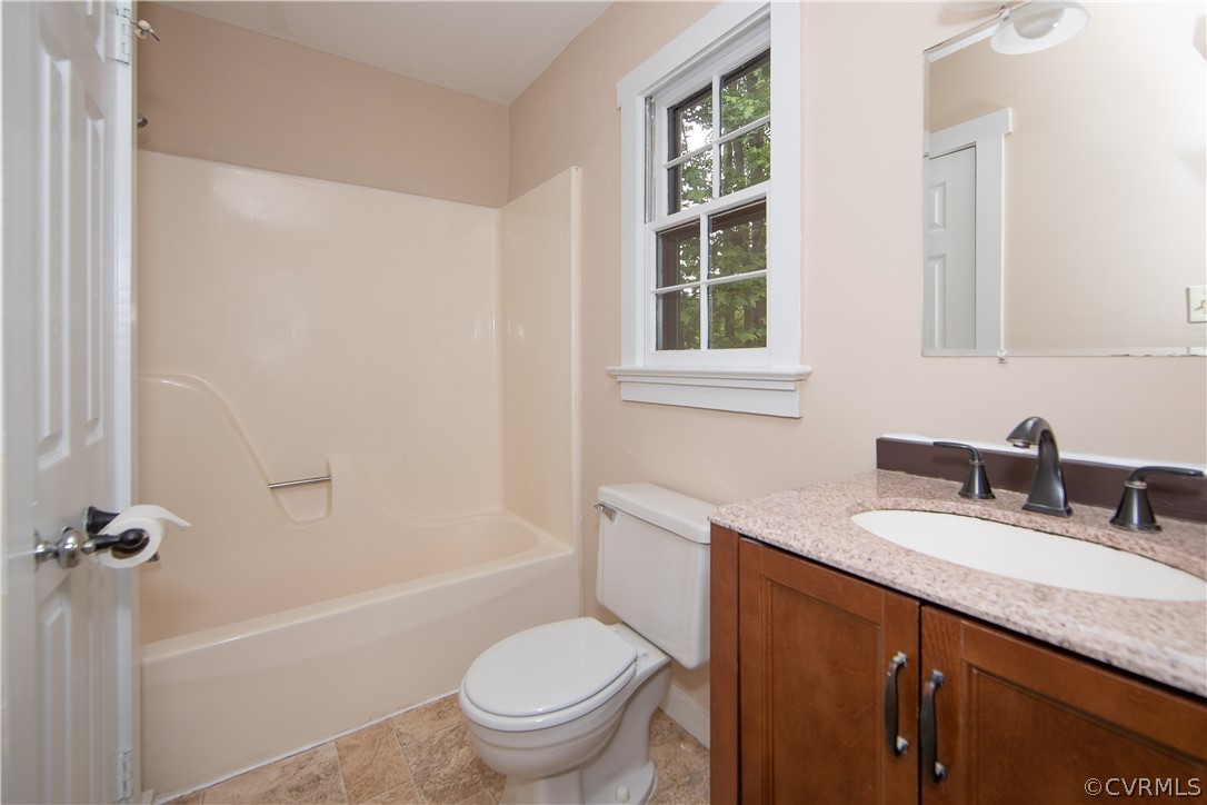 4702 Wilconna Road Chesterfield, VA 23832 - Photo 27 of 27 a bathroom with a granite countertop sink toilet and shower