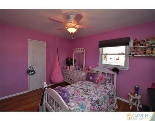 38 Dumas Road Old Bridge, NJ 08857 - Photo 14 of 18 a bedroom with a bed a dresser and chair
