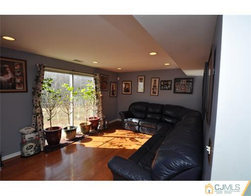 38 Dumas Road Old Bridge, NJ 08857 - Photo 6 of 18 a living room with furniture and a large window