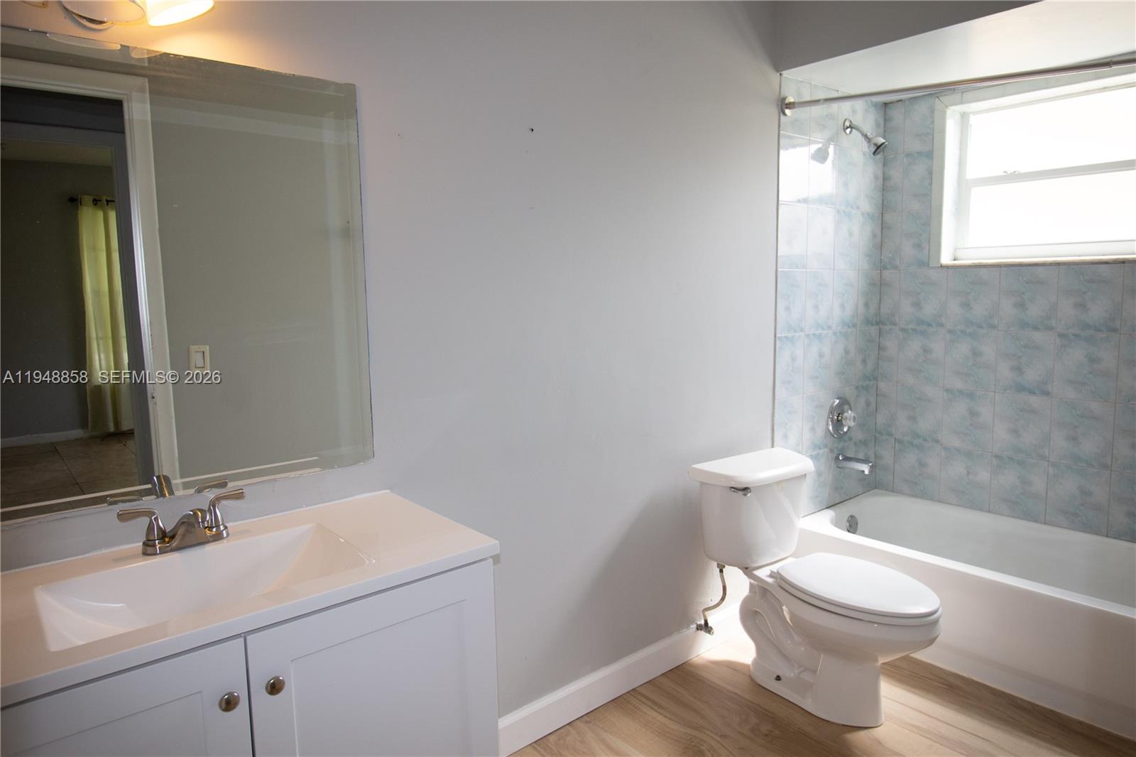 420 Southwest 62nd Avenue Margate, FL 33068 - Photo 16 of 22 a bathroom with a sink a toilet and shower