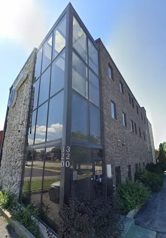 a building view with a backyard space
