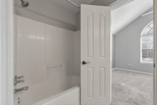 a bathroom with a bathtub