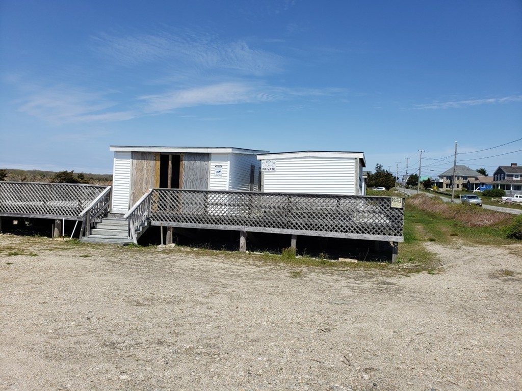 297 Howland Road Westport, MA 02790 - Photo 9 of 11 a view of a house with roof deck