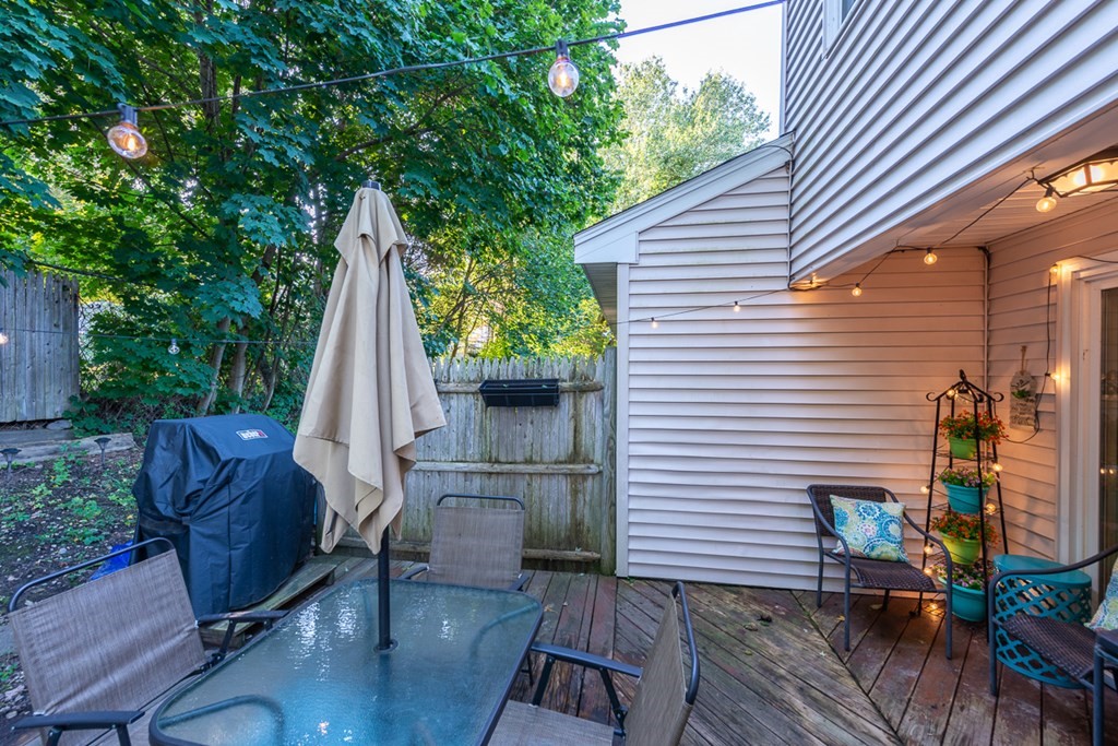103 Main Street, Unit 16 Pepperell, MA 01463 - Photo 30 of 33 a view of deck with patio