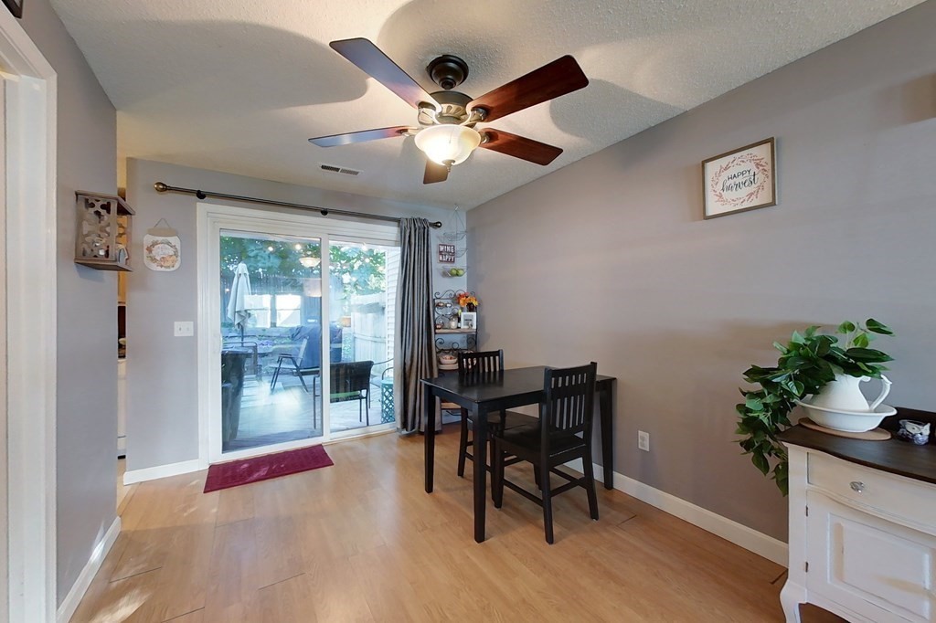 103 Main Street, Unit 16 Pepperell, MA 01463 - Photo 10 of 33 a workspace with furniture window and wooden floor
