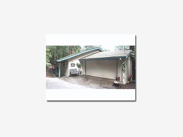 145 View Road Felton, CA 95018 - Photo 1 of 3 a view of a house with a balcony