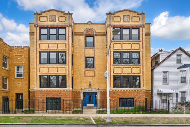 4325 North Troy Street, Unit 2 Chicago, IL 60618 - Photo 1 of 1 a front view of a multi story residential apartment building