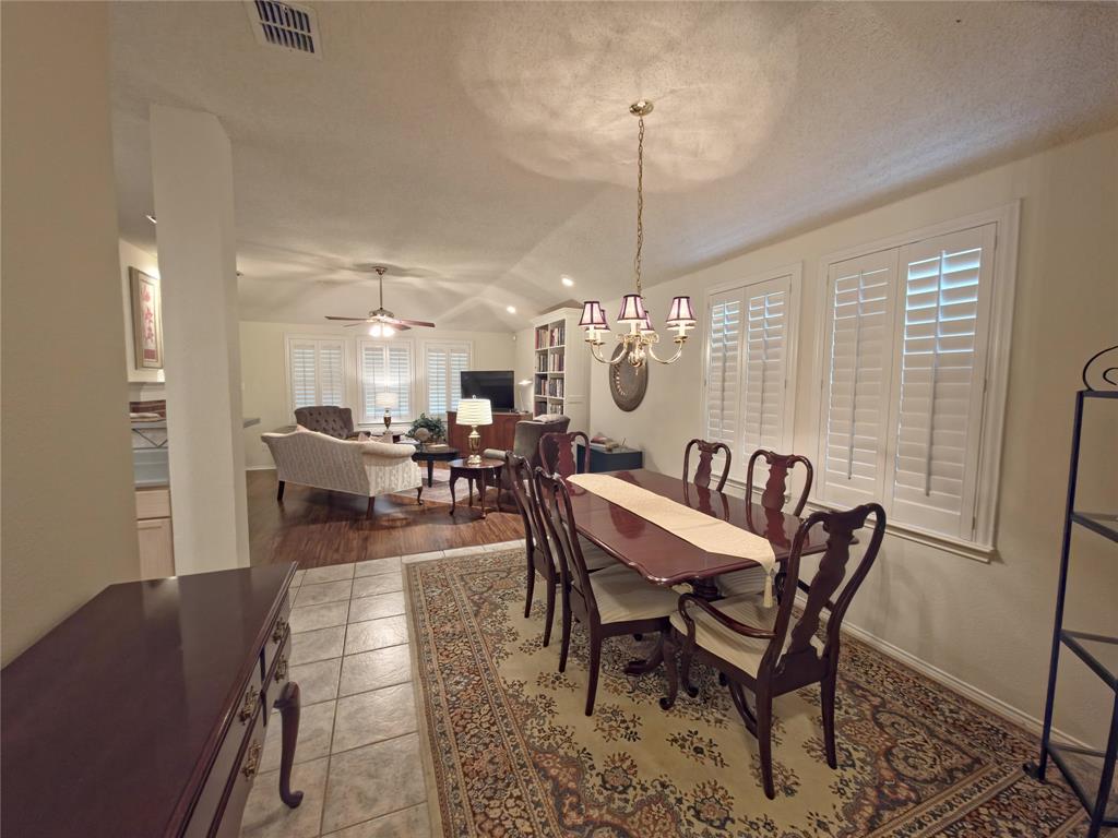 514 Pinto Lane Forney, TX 75126 - Photo 4 of 28 a view of a dining room with furniture