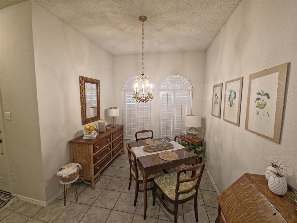 514 Pinto Lane Forney, TX 75126 - Photo 7 of 28 a view of a livingroom with furniture and a chandelier