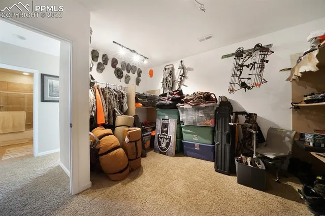 a workspace with furniture and a window