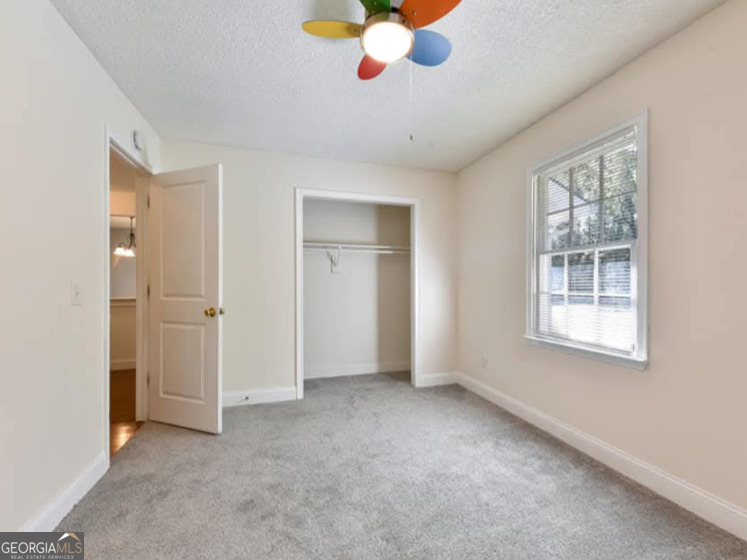 206 Palmetto Street St. Marys, GA 31558 - Photo 15 of 25 a view of an empty room with a window