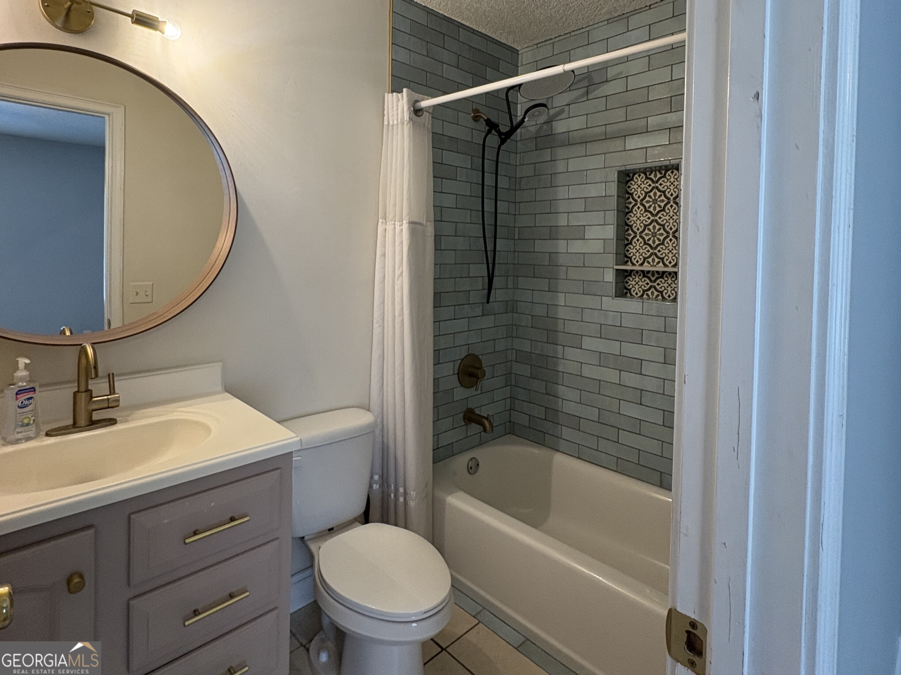 206 Palmetto Street St. Marys, GA 31558 - Photo 20 of 25 a bathroom with a sink toilet and shower