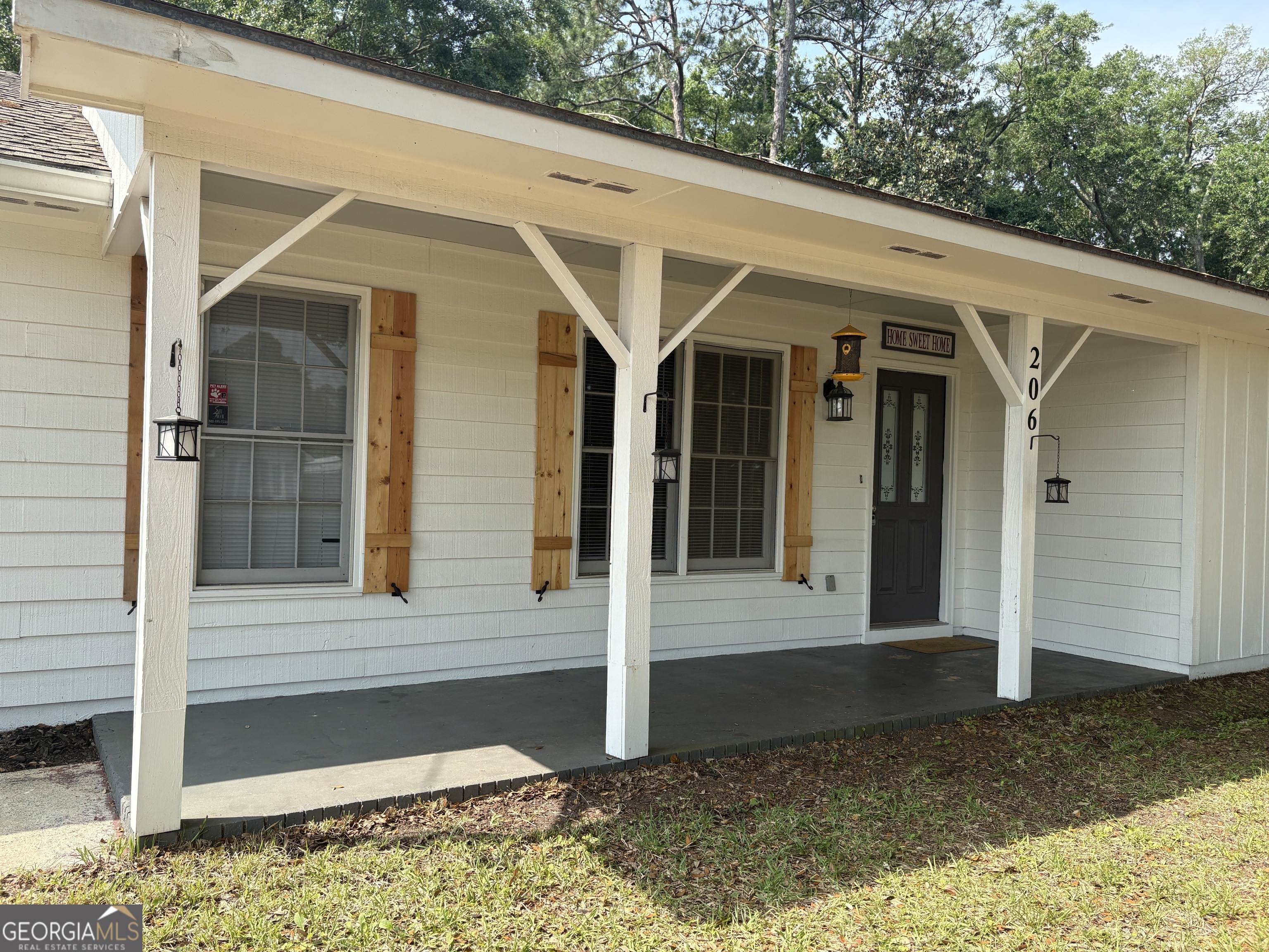206 Palmetto Street St. Marys, GA 31558 - Photo 4 of 25 a view of a house with a yard