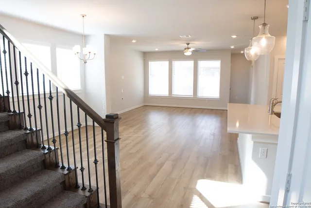 workspace with wooden floor and windows
