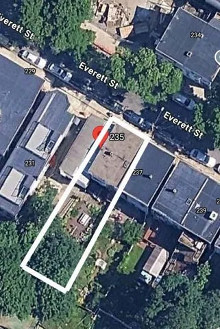 an aerial view of a city with lots of residential buildings