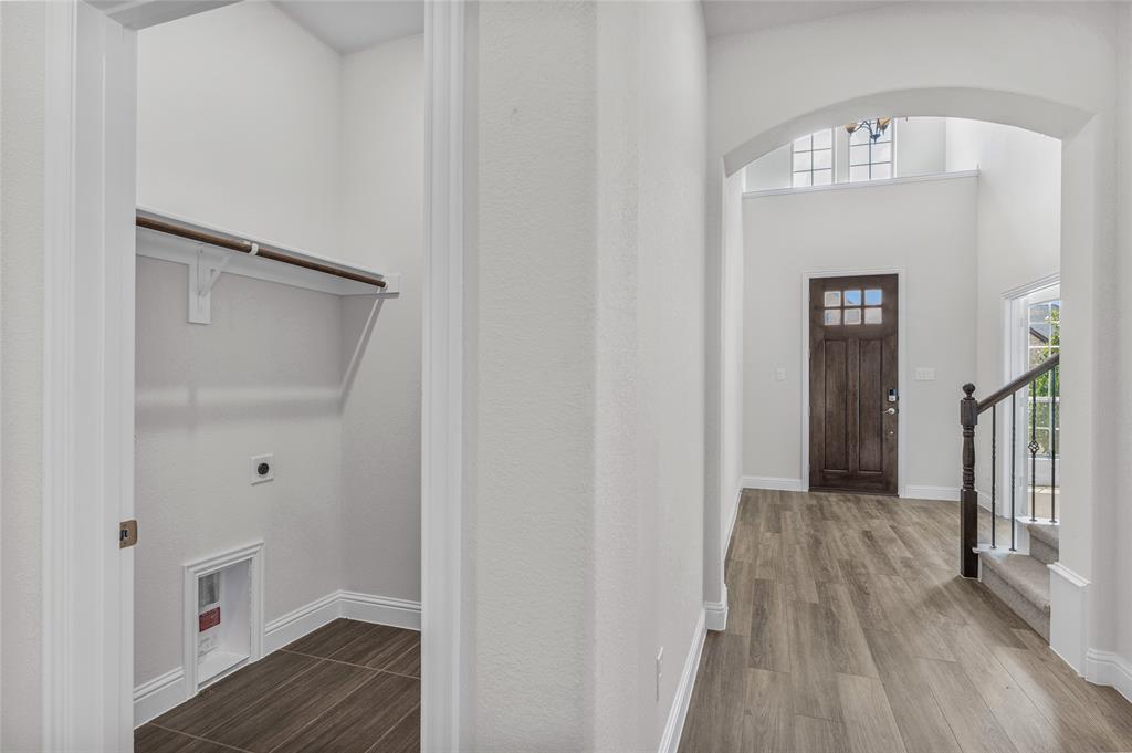 14566 Helena Street Pilot Point, TX 76258 - Photo 21 of 37 a view of hallway with wooden floor