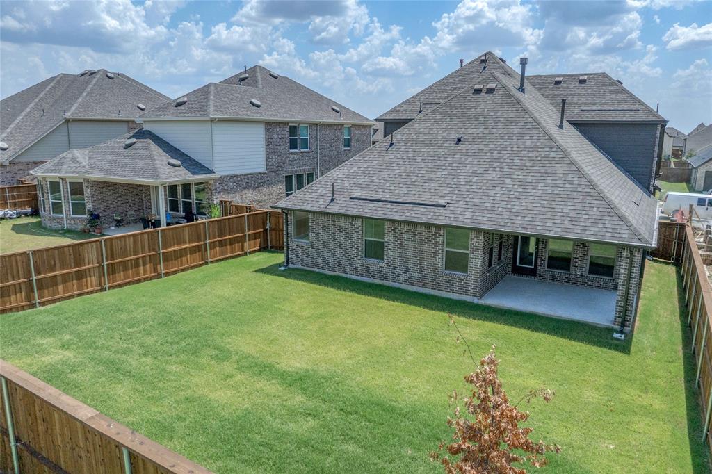14566 Helena Street Pilot Point, TX 76258 - Photo 37 of 37 a view of a house with a garden and yard
